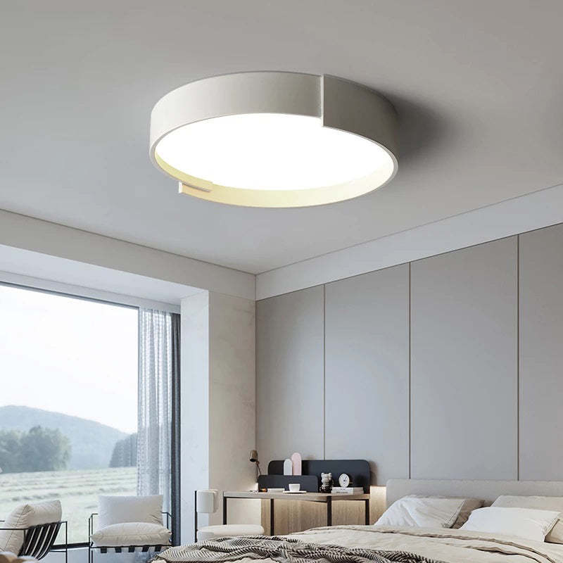 Quinn Round Flush Mount Ceiling Light in bedroom