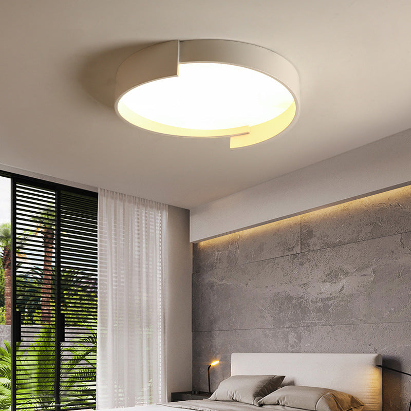 Quinn modern ceiling light in a bedroom, illuminating the space.