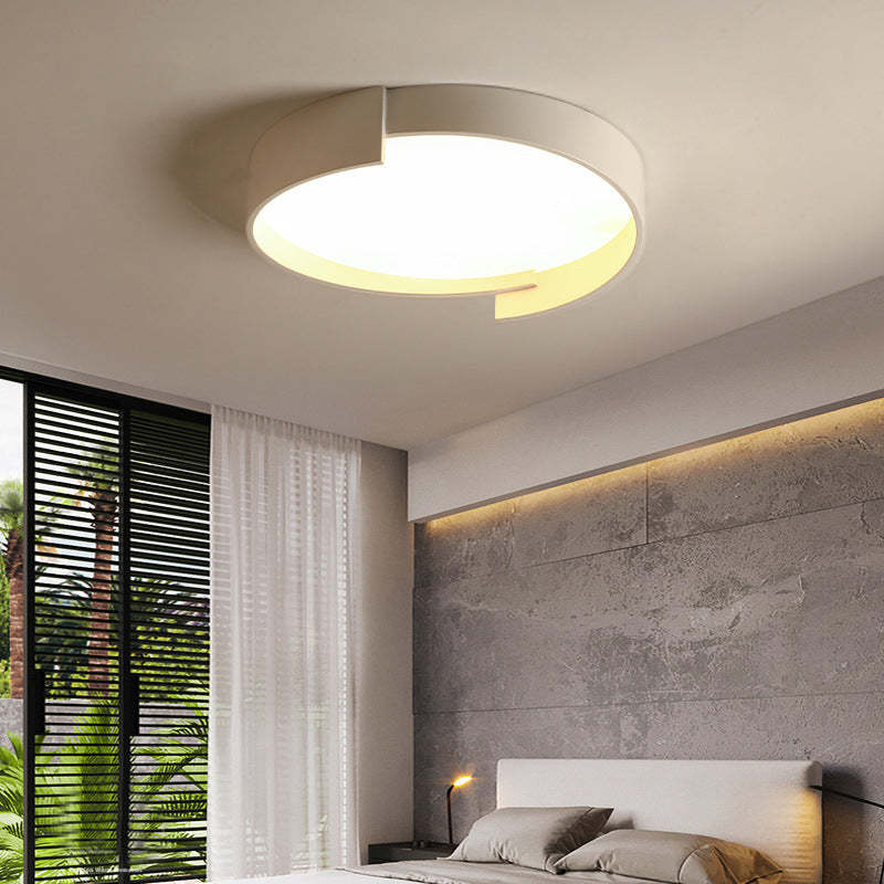 Quinn modern ceiling light in a bedroom, illuminating the space.