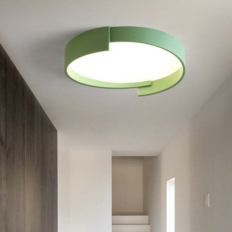 Green Quinn Round Flush Mount Ceiling Light installed in the hallway