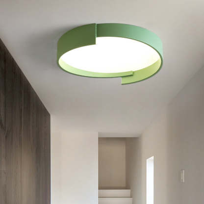 Green Quinn Round Flush Mount Ceiling Light installed in the hallway