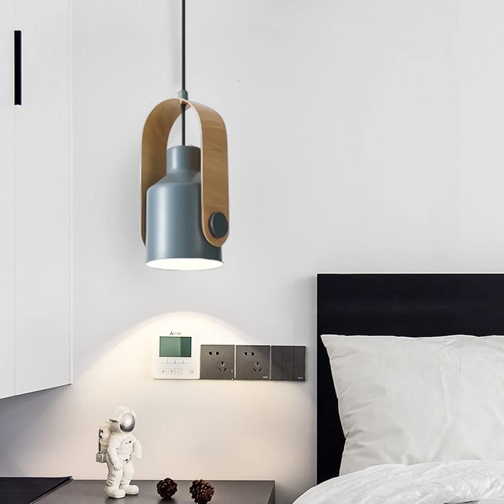 Morandi pendant light illuminates bedroom, wood accent, stylish bedroom lighting.