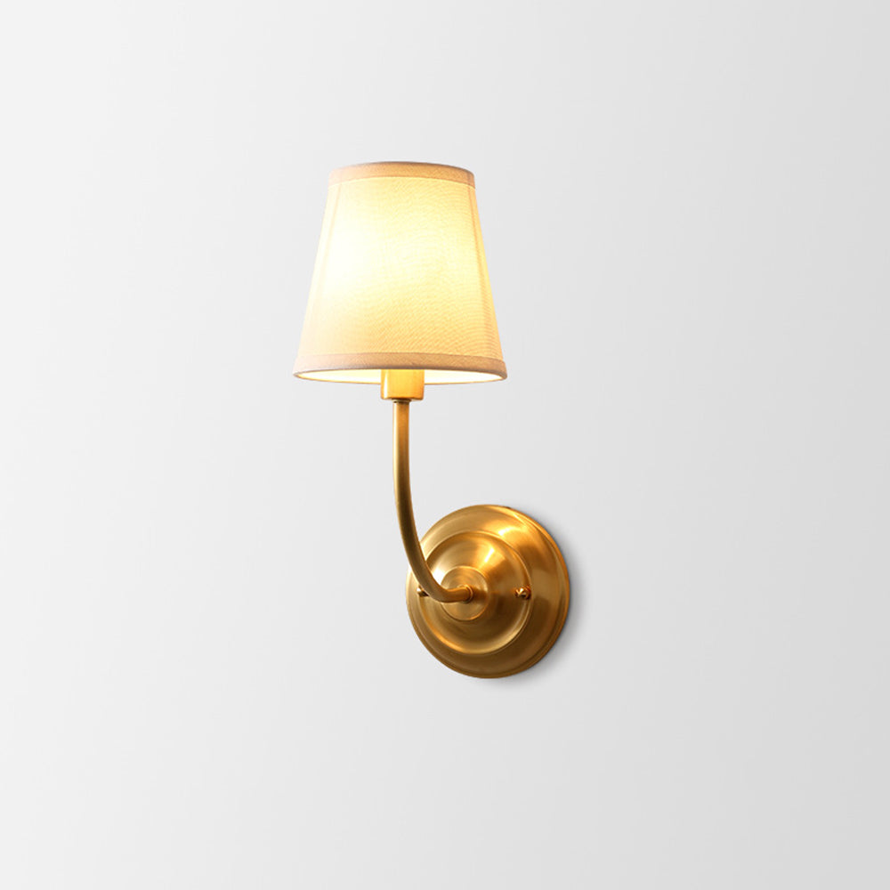 Alessio gold wall lamp with fabric shade. Rustic lighting.