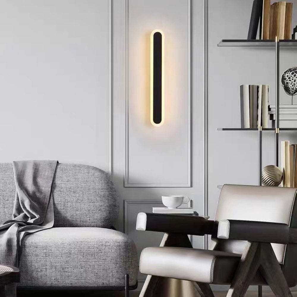 Modern oval wall lamp. Minimalist lighting in living room.