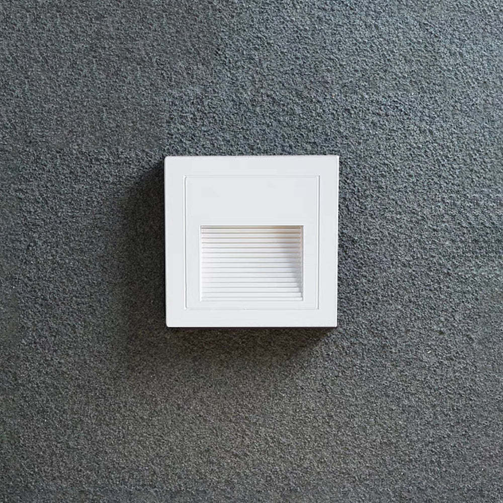 White Orr Square Step Light on Textured Wall