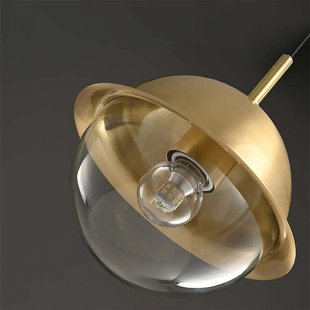 Valentina Pendant Light close-up - Gold metal and glass globe
