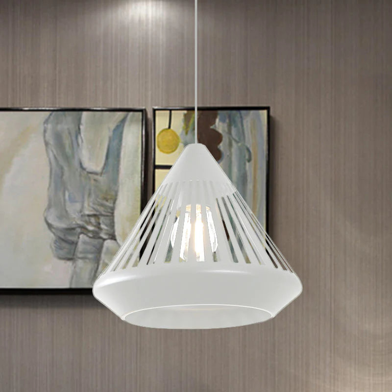 White Nazifa pendant light over artwork, modern minimalist lighting.