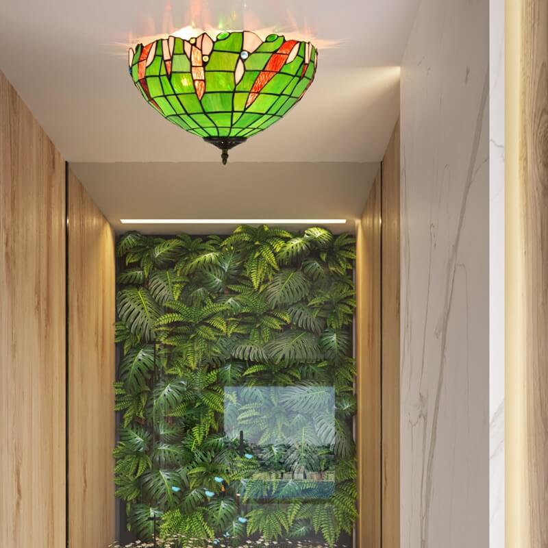 Eryn Glass Retro Flush Mount Ceiling Light above a green wall.