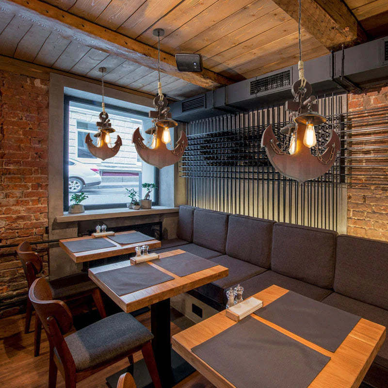 Retro anchor pendant light fixture in restaurant interior