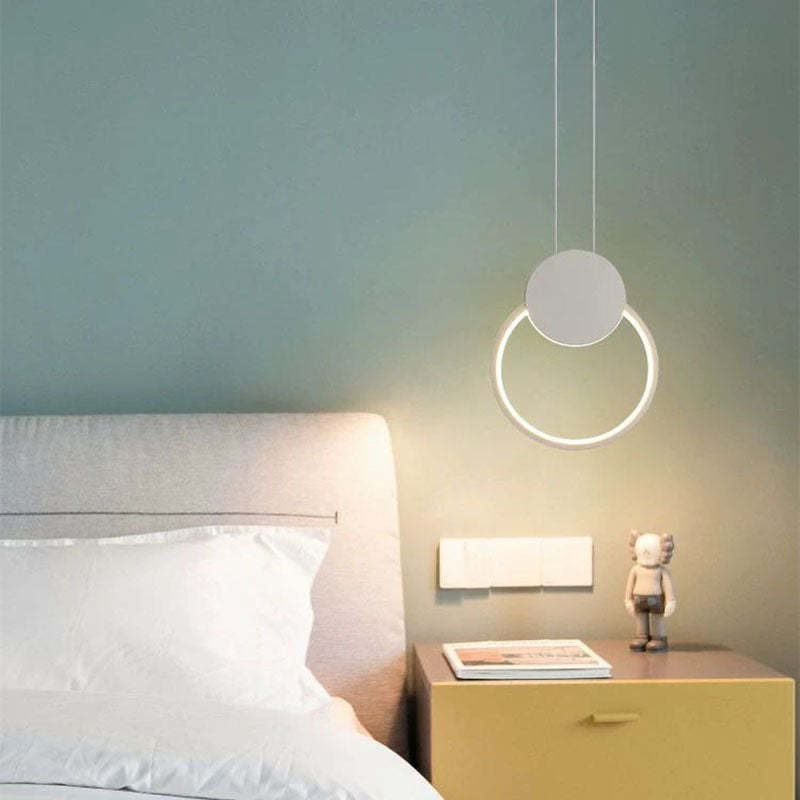 Modern minimalist LED pendant light in bedroom setting