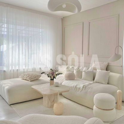 Minimalist living room with Byers cloud pendant light.