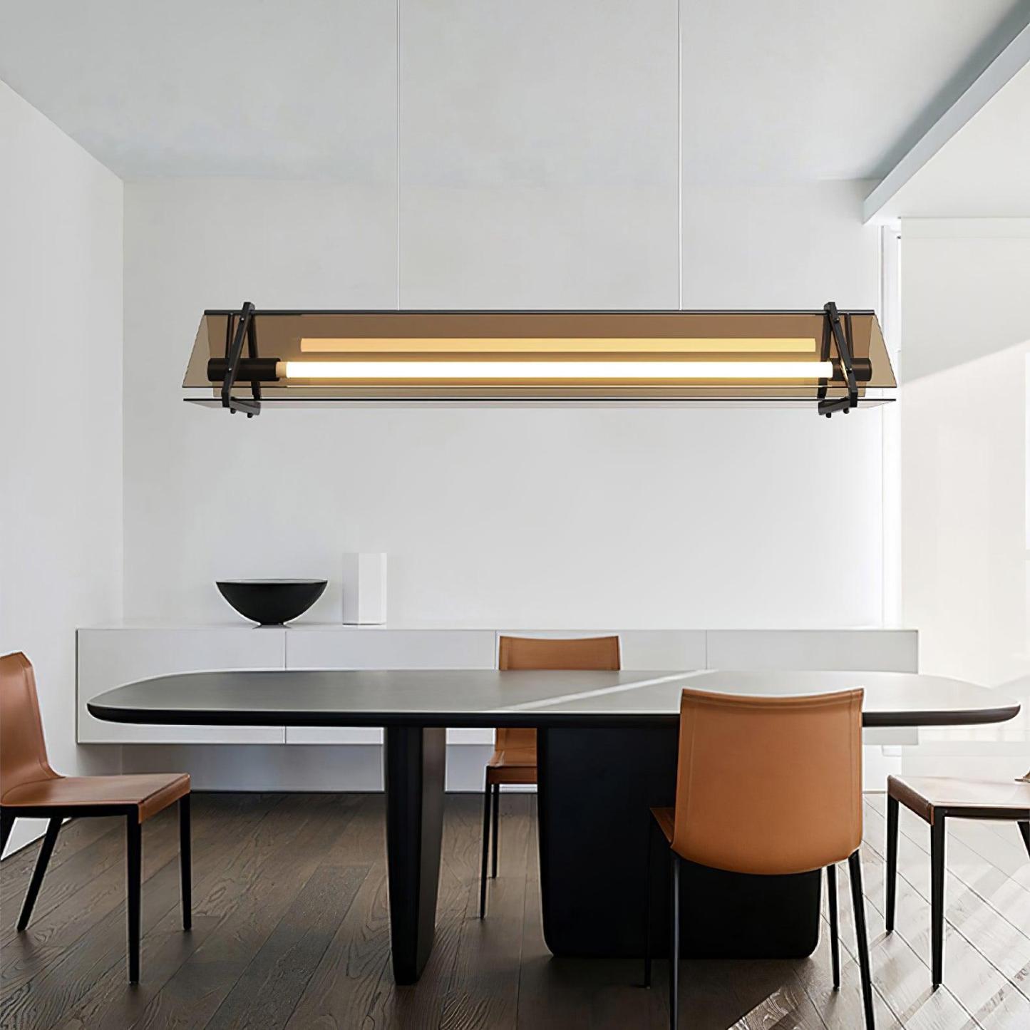Modern rectangular pendant light over dining table