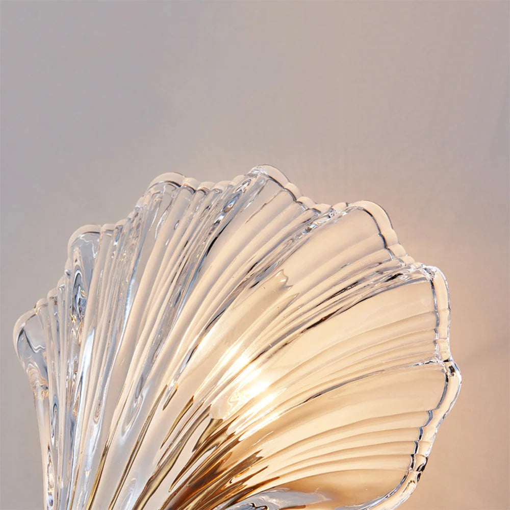 Close-up of Veta Fashion Wall Lamp's shell-shaped glass shade.