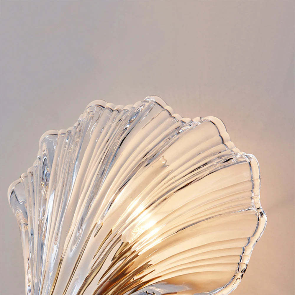 Close-up of Veta Fashion Wall Lamp's shell-shaped glass shade.