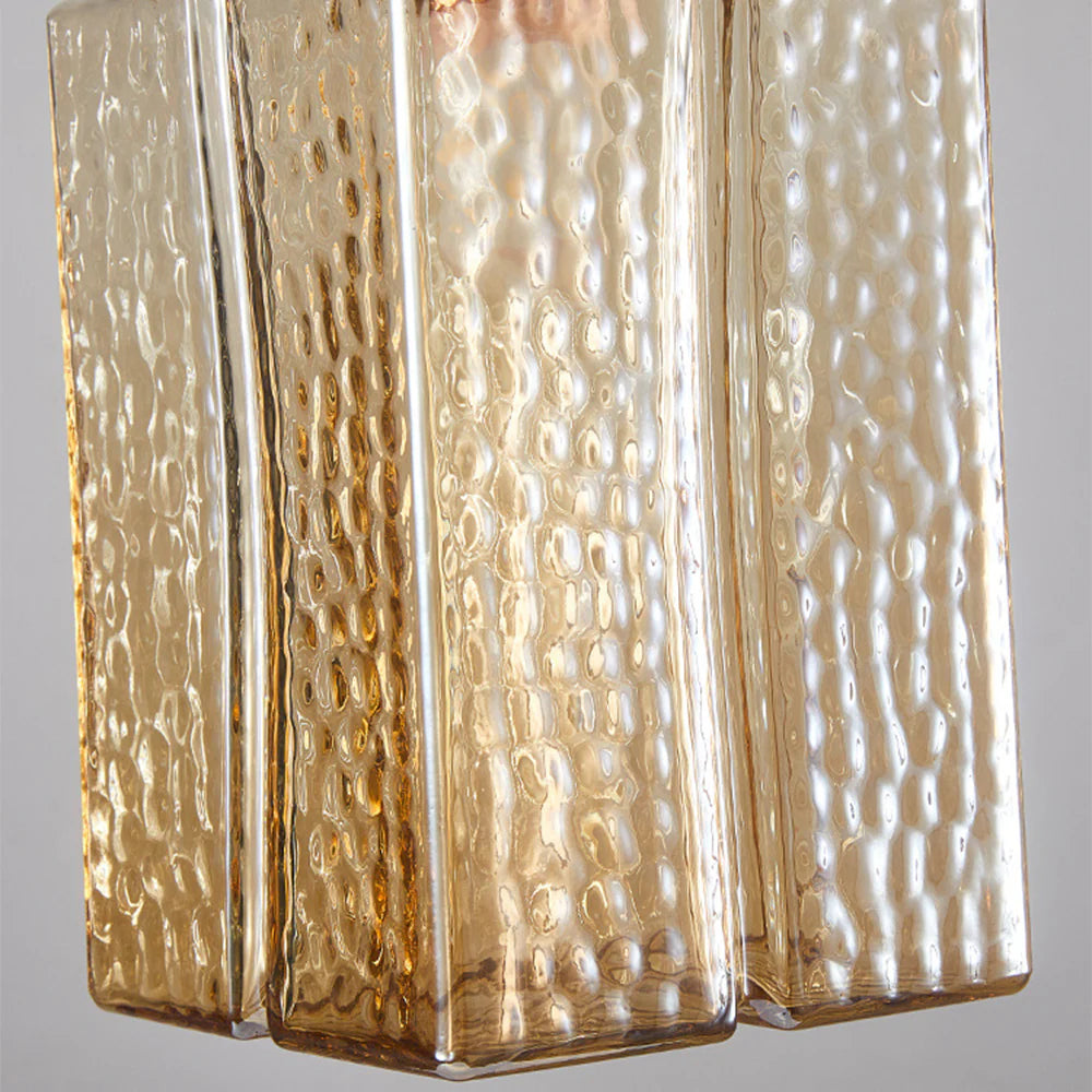 Alessio Pendant Light: Textured Amber Glass Close-up
