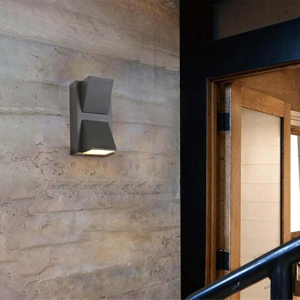 Orr Modern Metal LED Outdoor Wall Lamp on a concrete wall