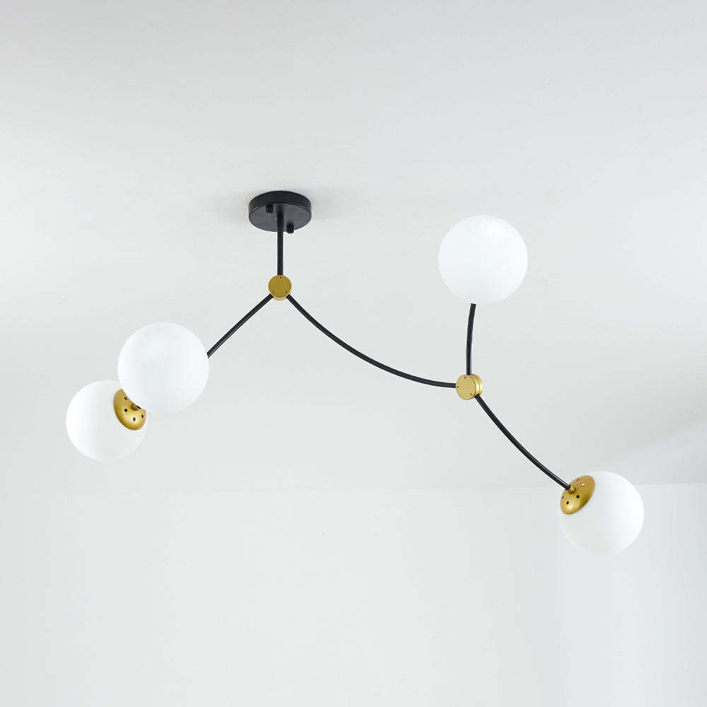 Minimalist Valentina Chandelier, white globes, Lassola Lighting