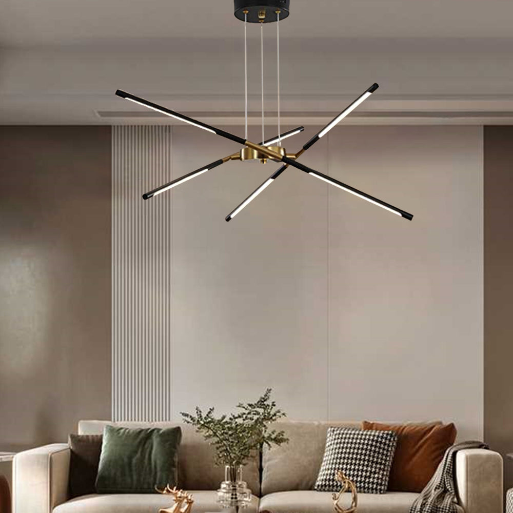 Black and gold edge pendant light over sofa