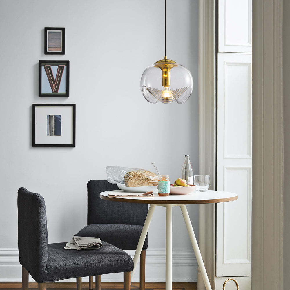 Hailie Modern Wave Pendant Light above a breakfast table