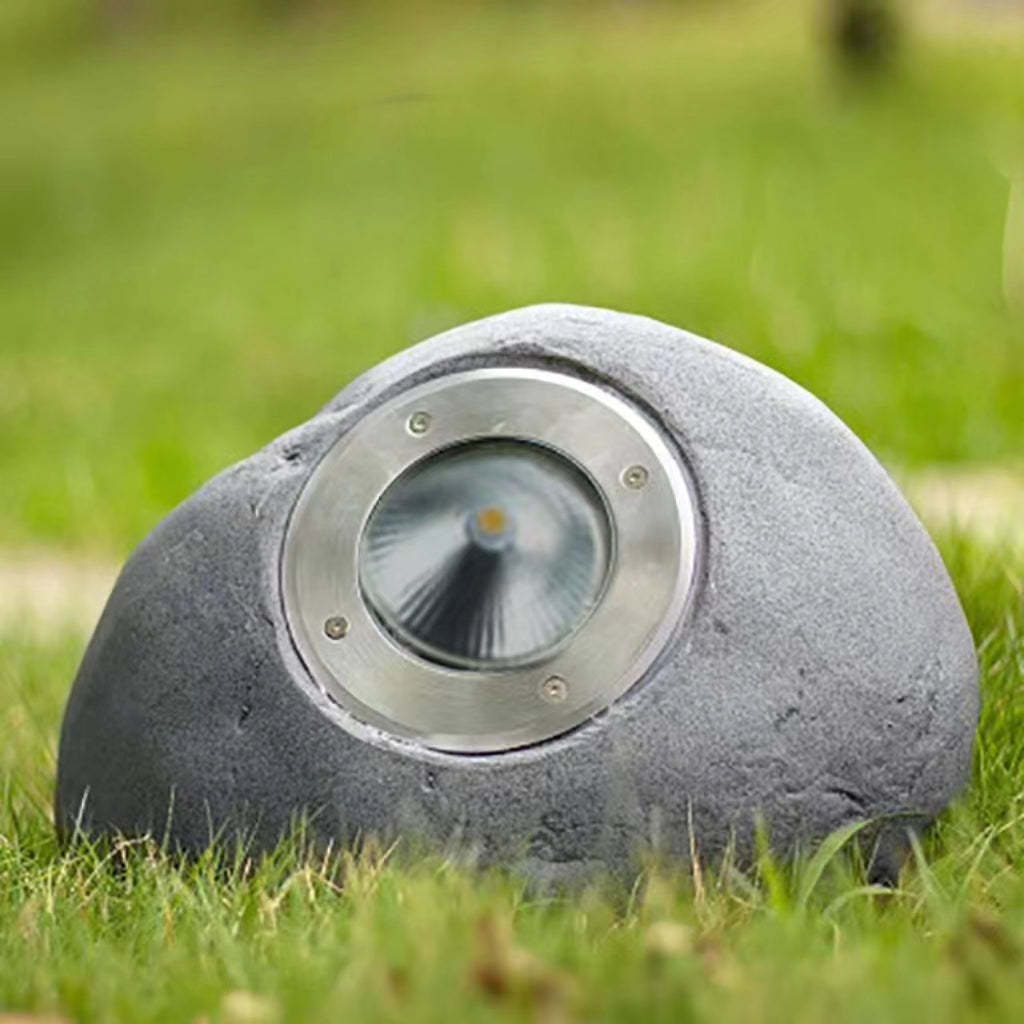 Pena Stone Outdoor Light in grass, metal and resin design