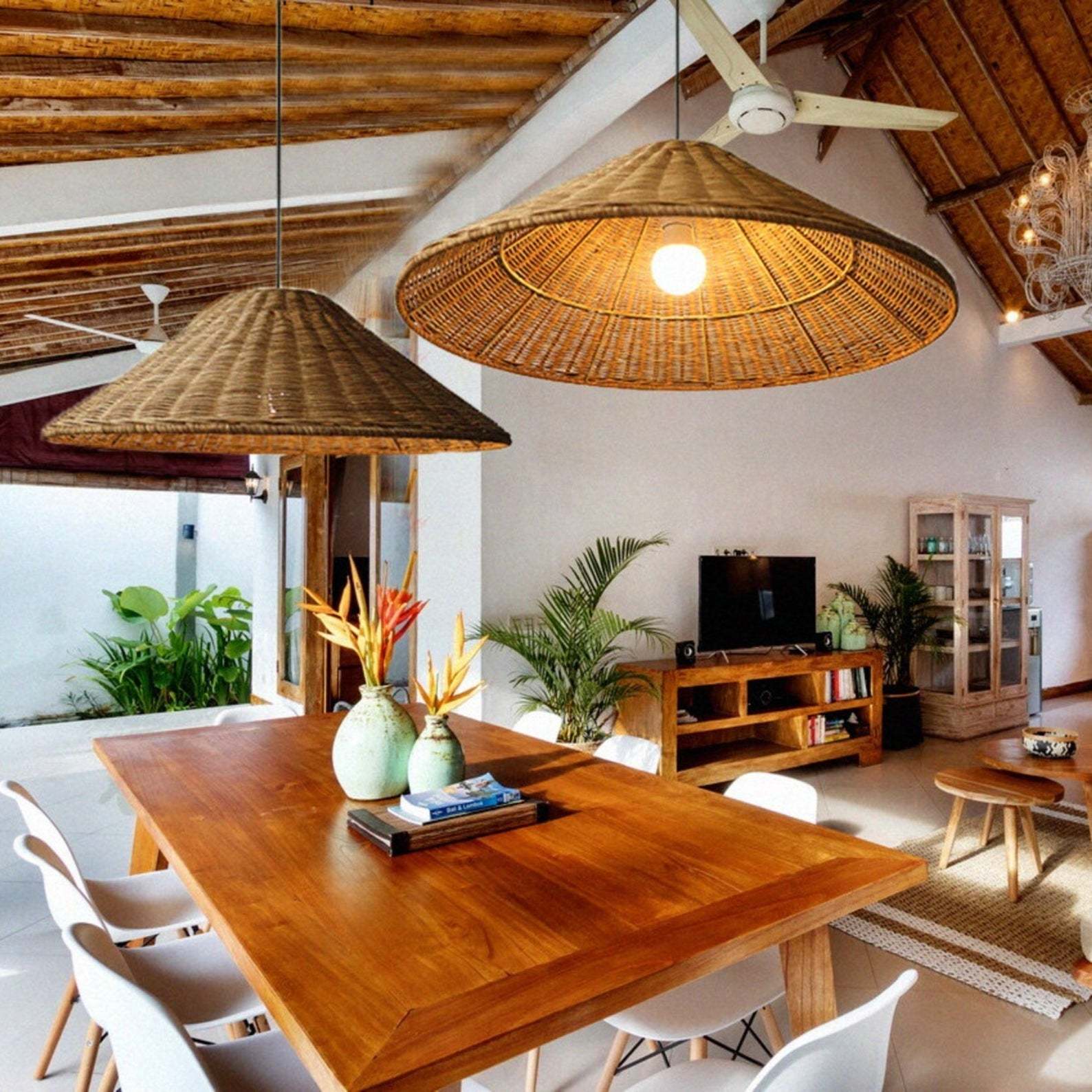 Rattan pendant lights above a wooden dining table