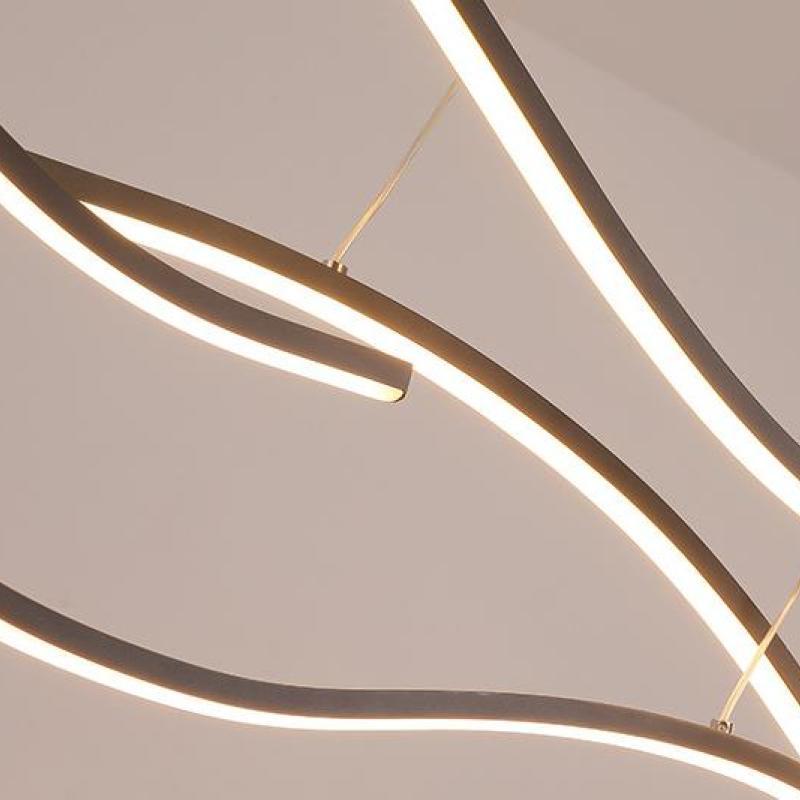 Louise Pendant Light: Modern curved LED linear design.