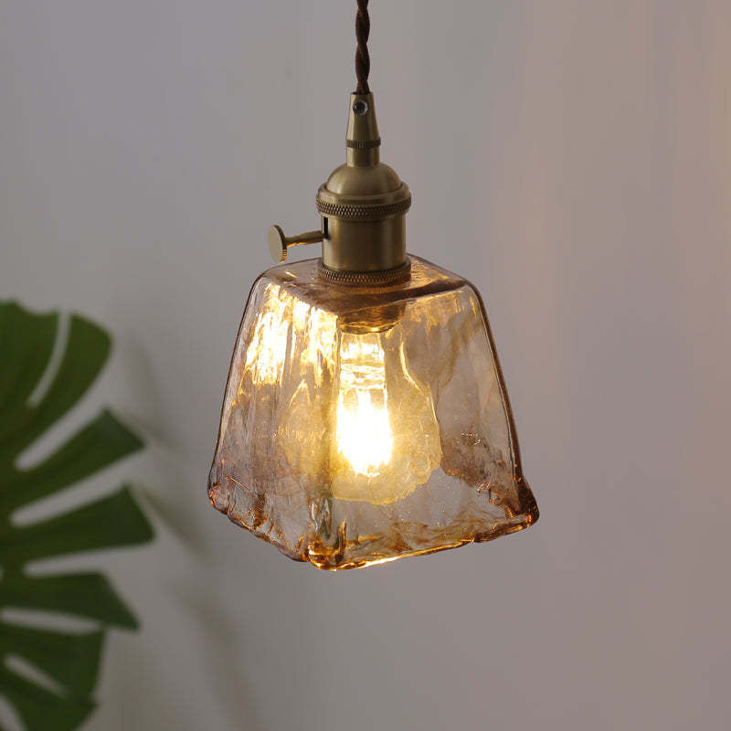 Levy pendant light, caramel glass shade.