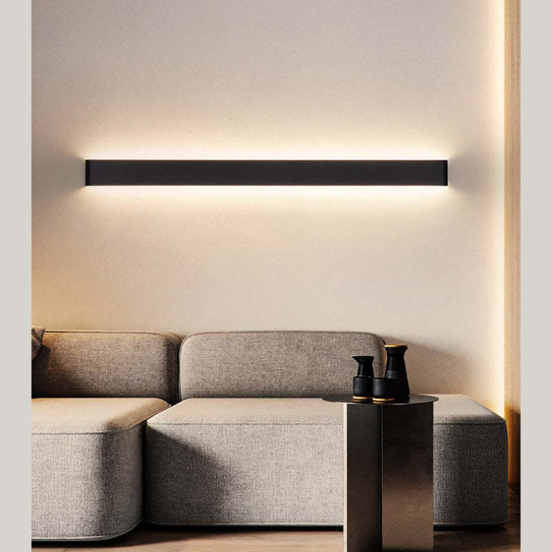 Edge Minimalist Wall Lamp illuminating living room, modern interior decor