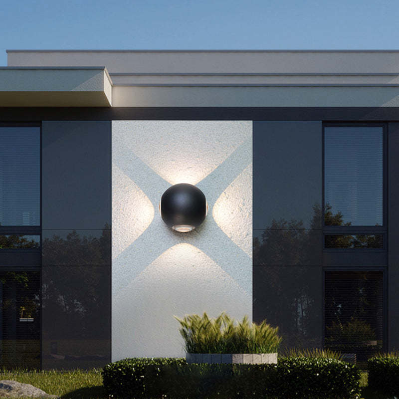 Orr outdoor wall lamp illuminating modern building facade