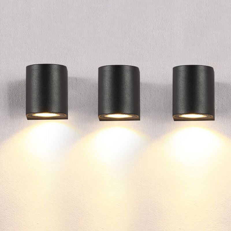 Orr minimalist outdoor wall lamps in black metal finish.