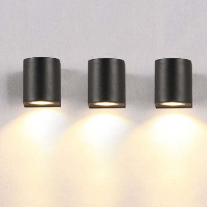 Orr minimalist outdoor wall lamps in black metal finish.