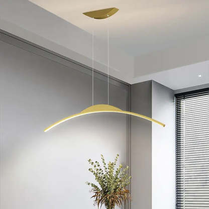Gold linear pendant light. Minimalist LED lighting fixture.