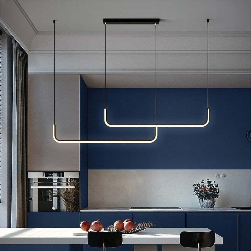 Modern linear pendant light over kitchen island, minimalist lighting