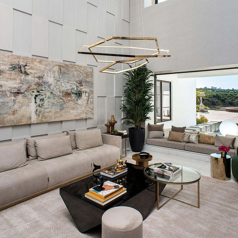 Modern living room with gold geometric pendant light