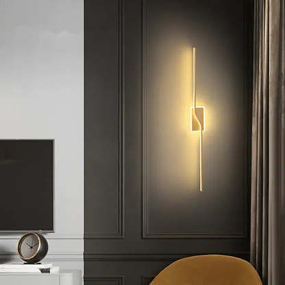 Modern minimalist wall lamp, linear design, gold finish, warm light
