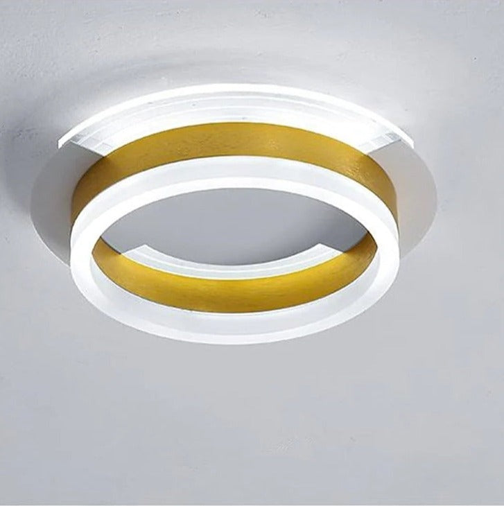 Amos gold round flush mount ceiling light.