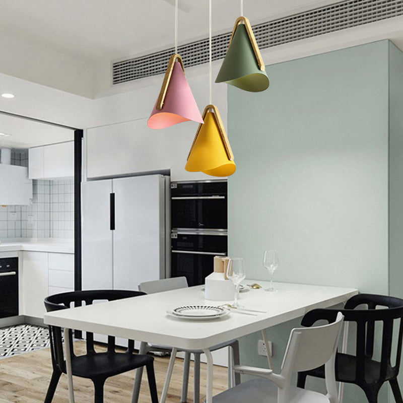 Colorful Morandi pendant lights above dining table