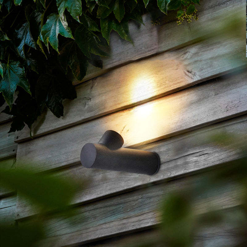 Orr Modern LED Outdoor Wall Lamp illuminating wooden wall
