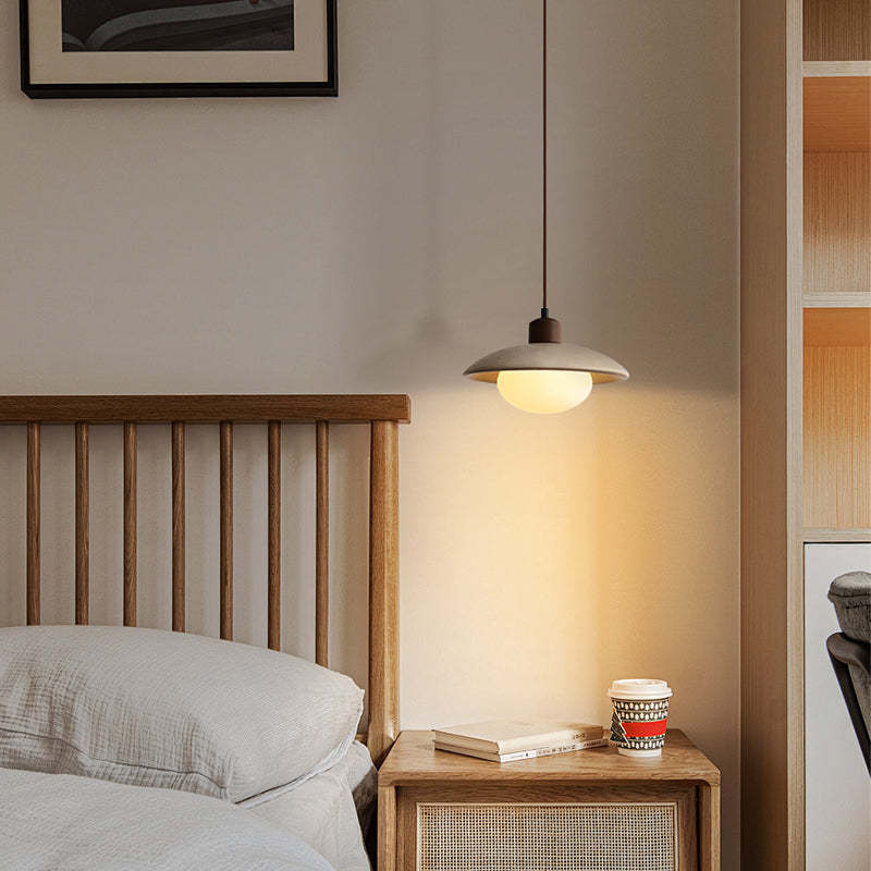 Hailie Wabi-Sabi pendant light illuminates bedroom
