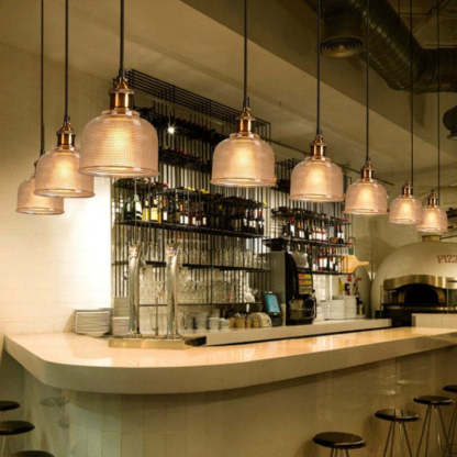 Art Deco pendant lights above bar