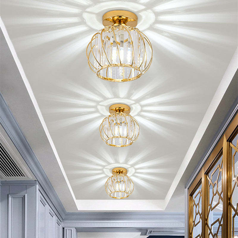 Gold crystal ceiling lights illuminating hallway