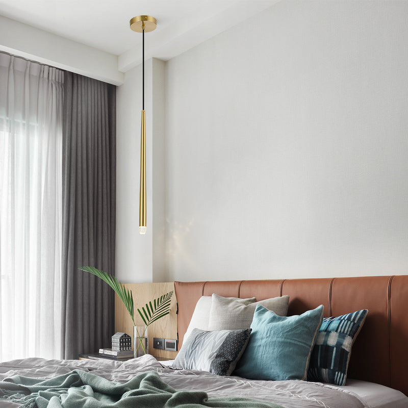 Carr pendant light in modern bedroom setting.