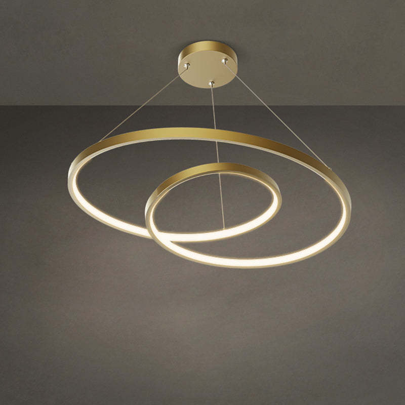 Arisha brass circle pendant light. Modern Las Sola fixture.