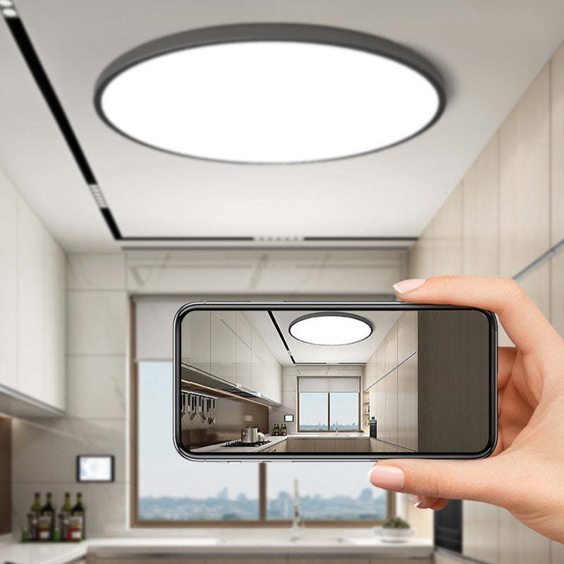 Quinn Round LED Ceiling Light in a modern kitchen, showcased on smartphone.
