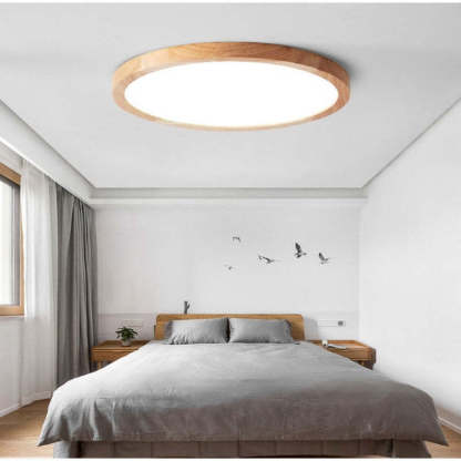 Modern wood ceiling light in bedroom. Ozawa flush mount.