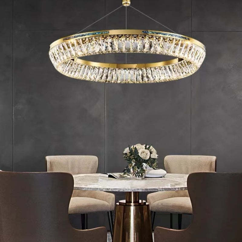 Gold crystal chandelier over dining table