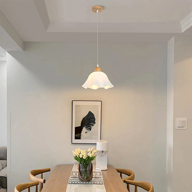 Ozawa minimalist flower pendant light in dining room.