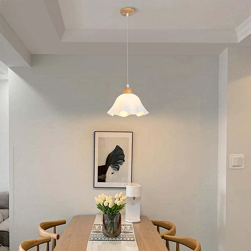 Ozawa minimalist flower pendant light in dining room.
