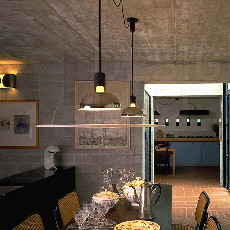 Levi pendant lights illuminating a dining room