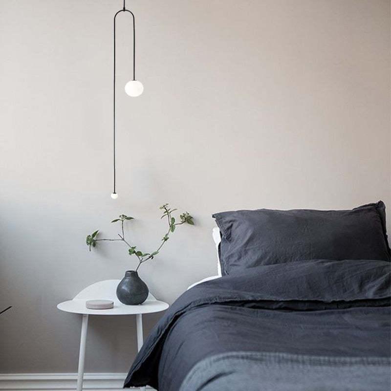Avi minimalist pendant light in bedroom | Las Sola